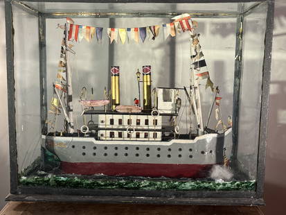 Folk Art Tramp Steamer in Display Case: A whimsical folk art tramp steamer in glass case, early 20th century.20.5" w x 8.5" d x 17" h