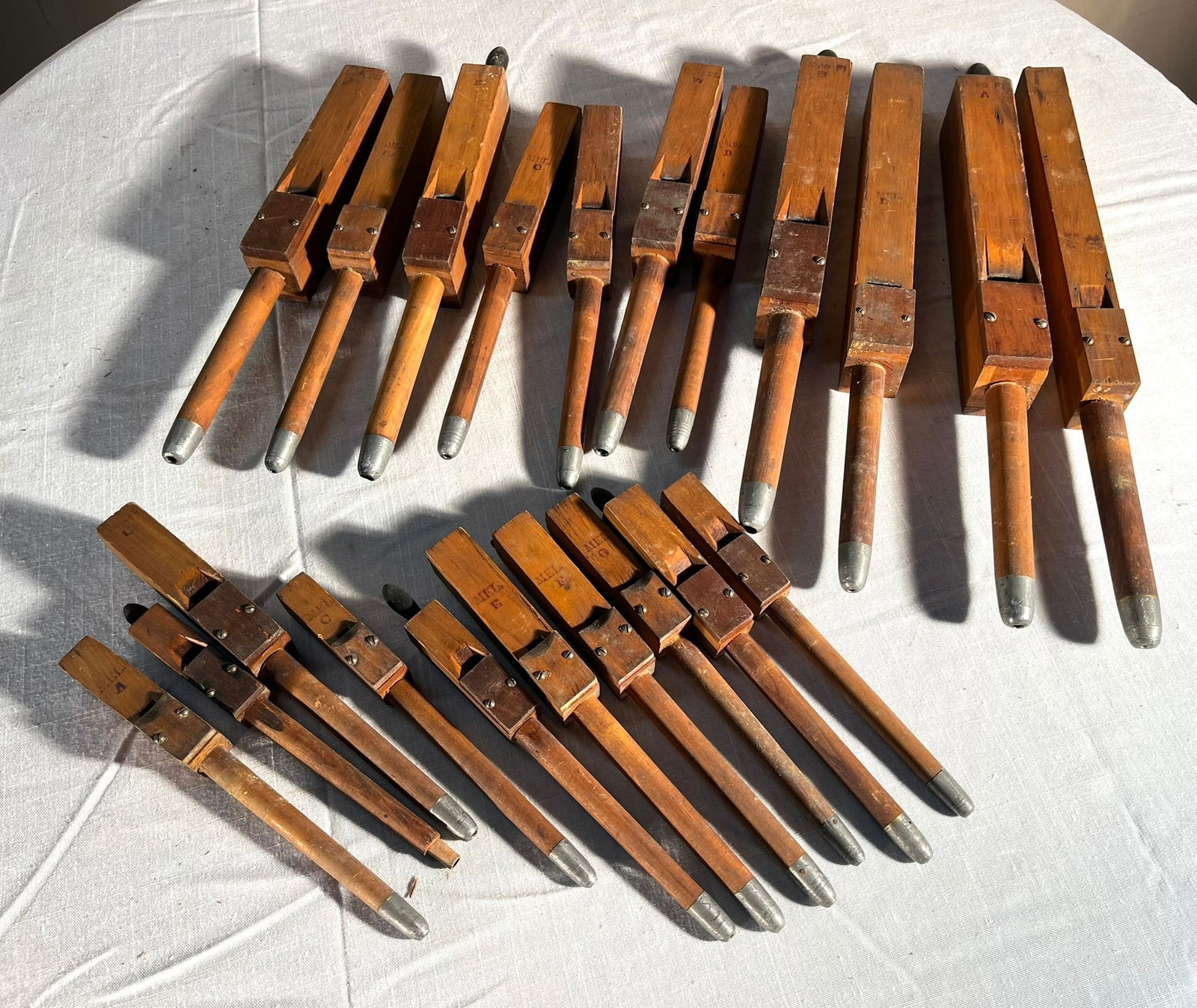 A Collection of 21 Small Church Organ Pipes: A collection of 21 small wood church organ pipes. 17" largest