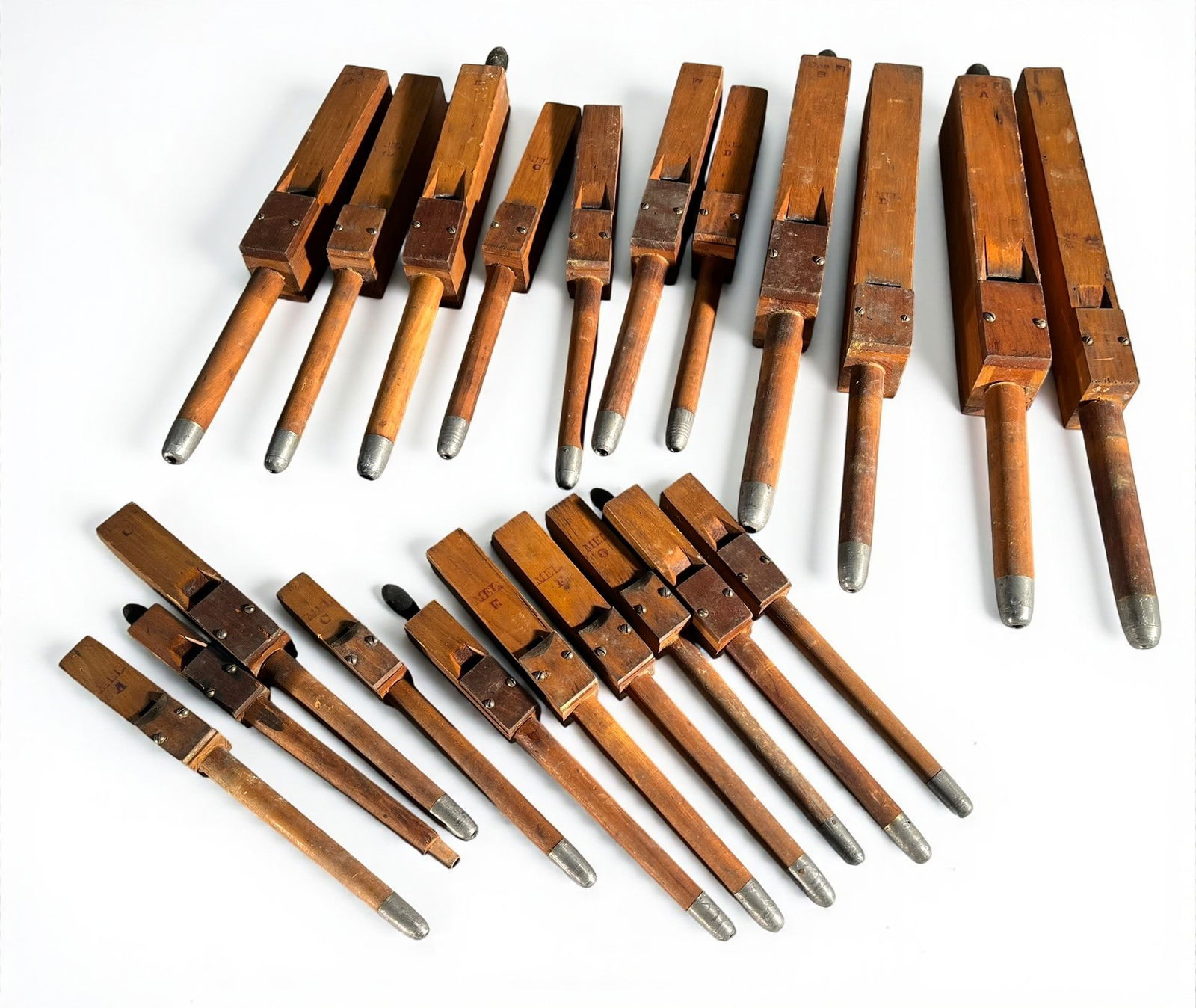 A Collection of 21 Small Church Organ Pipes: A collection of 21 small wood church organ pipes. 17" largest