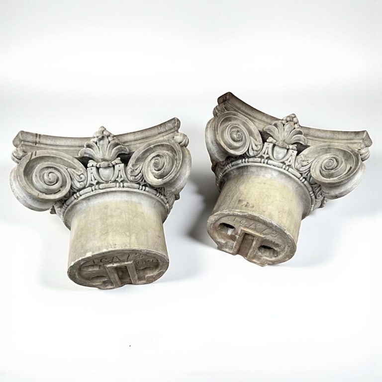 Large Pair of Architectural Capitals: A pair of glazed terracotta architectural capitals, early 20th century.19" d x 24" w x 17" h