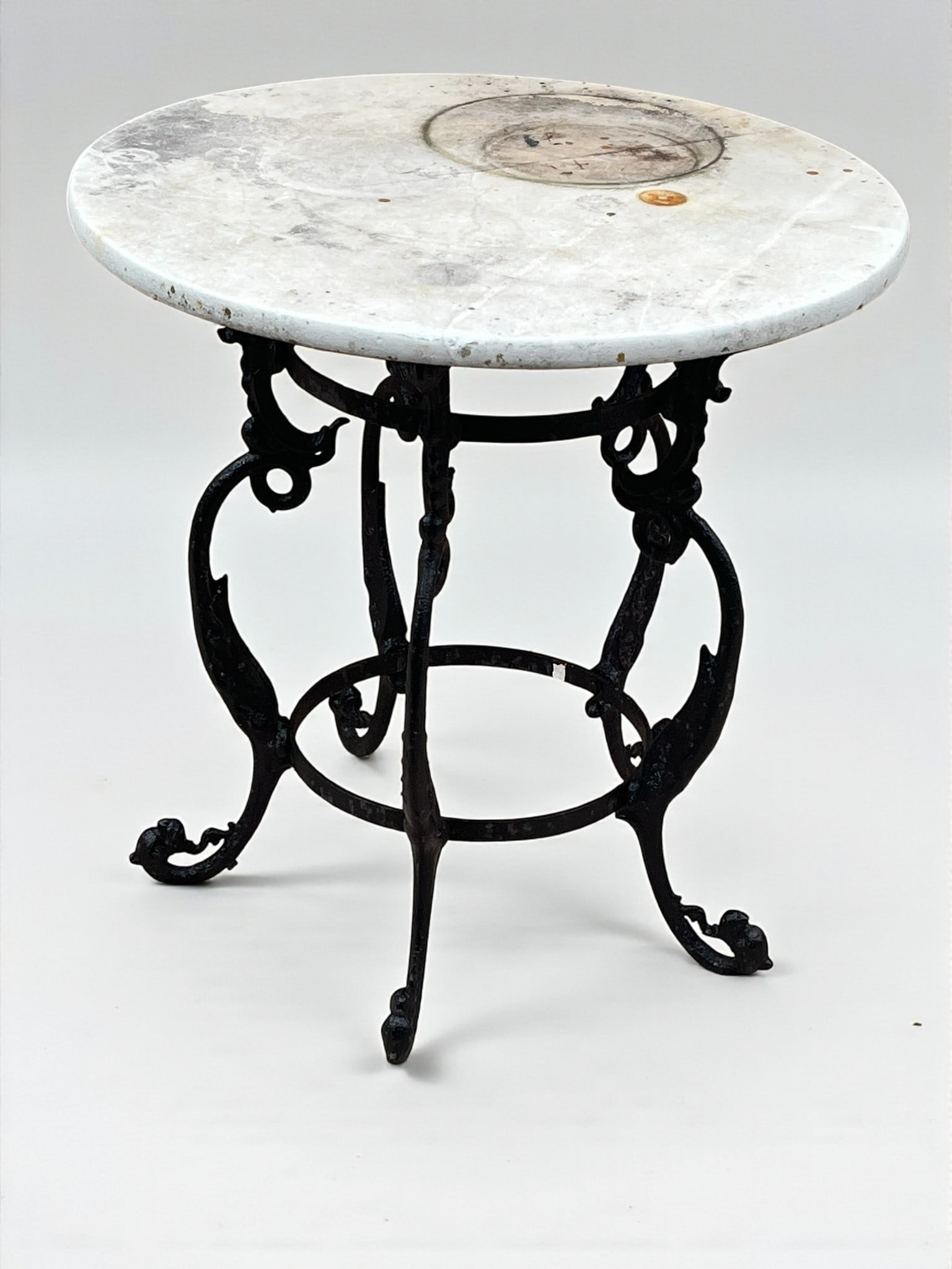 Wrought Iron Table Base: Wrought iron table base with associated circular marble top. 19th century.27" dia. x 28" h