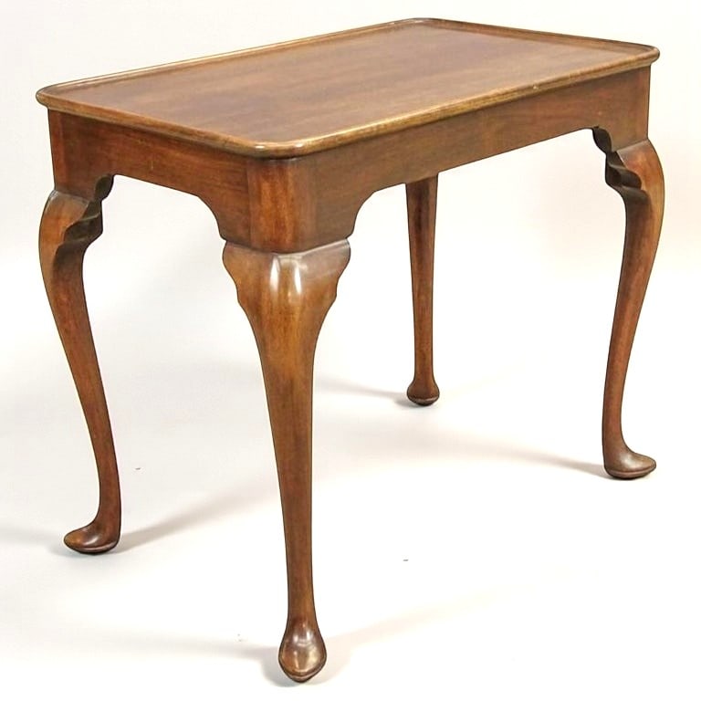 Queen Anne Style Side Table: A Queen Anne style side table in mahogany with cabriole legs and a dished top. 19.5" d x 30" w x 26" h