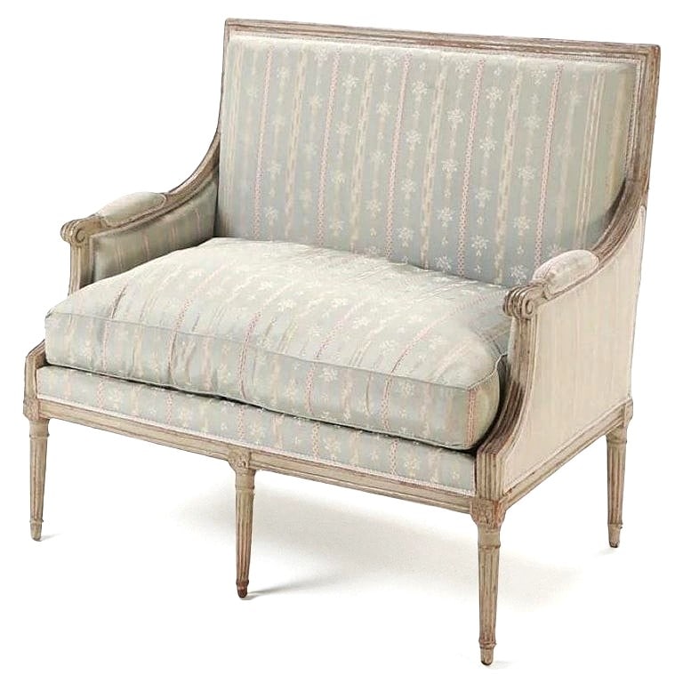 French Louis XVI Period Marquise, Circa 1780: A French Louis XVI period Marquise, circa 1780, in light grey painted finish, with silk taffeta upholstery. 24" d x 40" w x 37.5" h x 19" seat height.