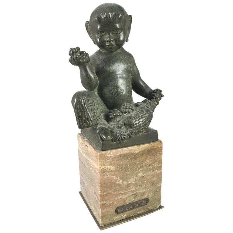 Bronze Sculpture of Faun, Marcel-Andre Bouraine, Circa 1930: A bronze Art-Deco sculpture of a Faun by Marcel-Andre Bouraine, (1886-1948) mounted on a marble base with name plate. 4" d x 5" w x 10.5" h overall.