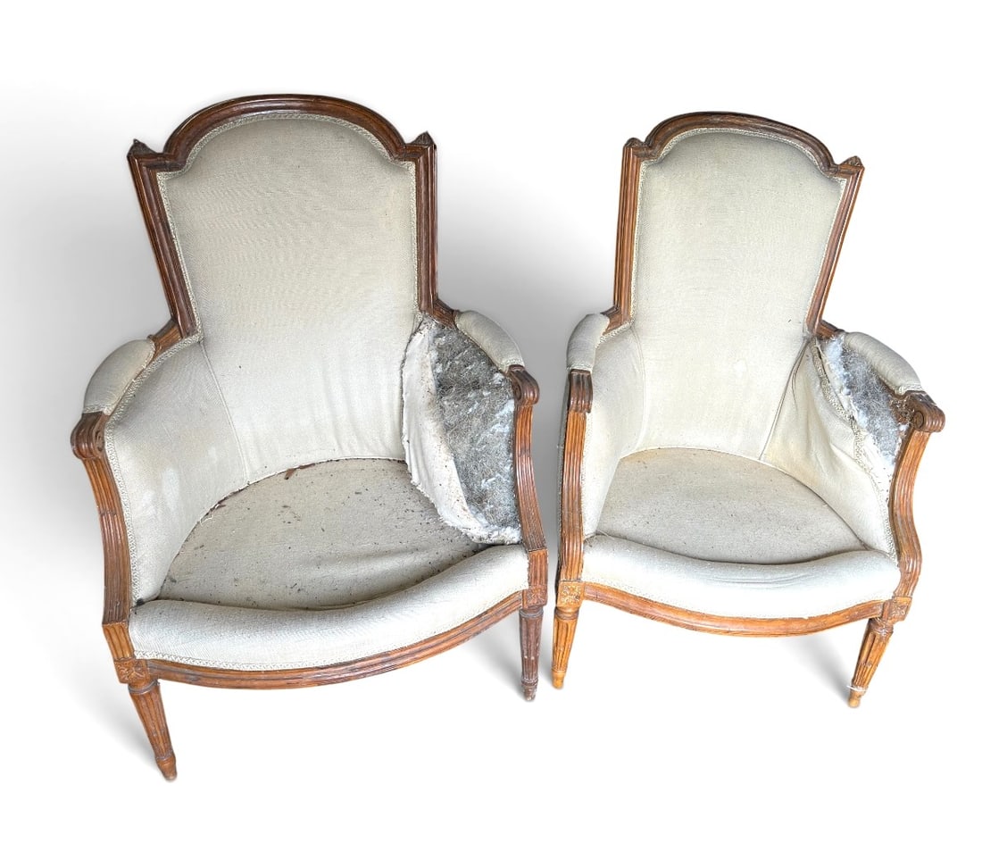 Matched Pair of Signed Louis XVI Bergeres, L M Pluvinet, Circa 1780: A pair of French Louis XVI bergere chairs in beech, signed under rail L M Pluvinet (Louis-Magdelaine Pluvinet, maitre 1775). 27" w x 29" d x 39" h En suite with lot 119.