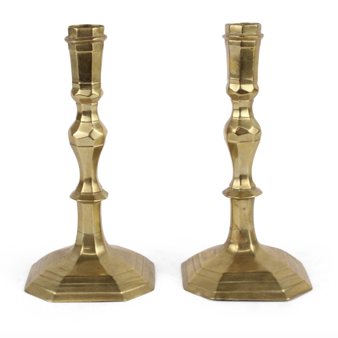 Pair of Queen Anne Brass Candlesticks: A pair of brass Queen Anne period candlesticks, circa 1680. 4.5" dia x " dia. x 8.5" h