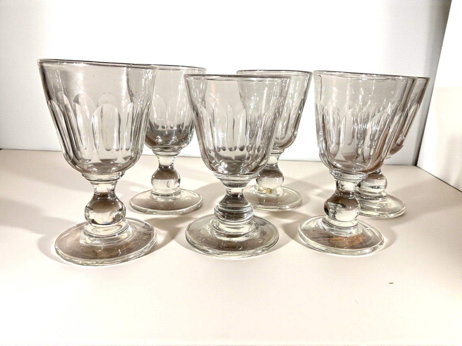 Set of 6 Early Wine Glasses, 19th Century: A set of 6 hand-blown wine glasses, possibly French, circa 1820. 3" dia. x 4.5" h