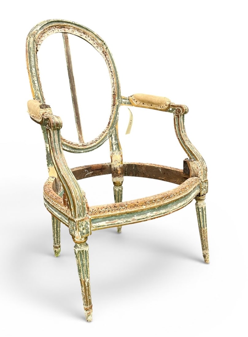 Louis XVI Chair Frame, Painted: A French Louis XVI fauteuil frame circa 1790, (en suite with lot 152) distressed painted finish. 20" x 20" x 35" h
