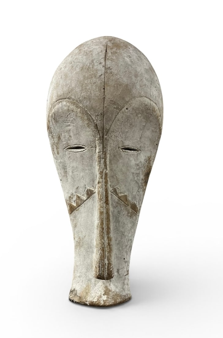 Fang Ngil African Mask: An African ceremonial mask from the Fang people of Gabon, likely a hand-made contemporary copy. 21" h