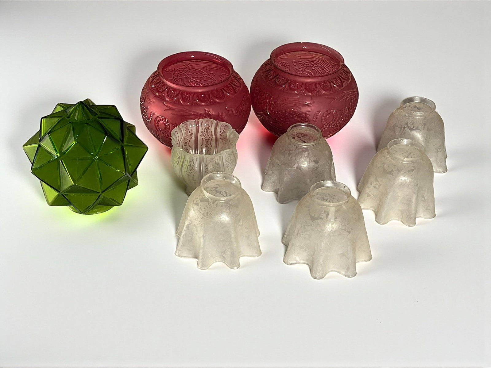 Collection of Blown Glass Lamp Shades: A collection of approximately 20 glass lamp shades, circa 1900-1930. Average size 5"