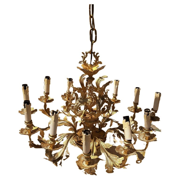 Large Brass Chandelier, 12-Arm: A large brass 12-arm chandelier in the French style. 36" dia. x 29" h