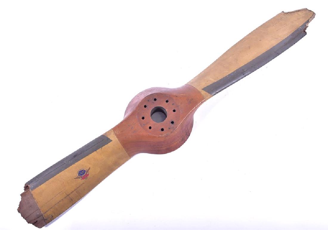 A 1930s de Havilland wooden propeller (cut down),: A 1930s de Havilland wooden propeller (cut down), produced for a Gipsy 1 engine, stamped 'R 12 34 / DRG No. DH 5180/1 / ISSUE 14 / dh gIPSY 1/ LH', and bearing a 'Aircsrew Co. Ltd' decal, 141 cm.