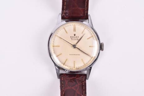 A Rolex Tudor stainless steel mechanical wristwatch: A Rolex Tudor stainless steel mechanical wristwatch the silvered dial signed Rolex Tudor, with slim baton numerals, and hand wound shock resisting 17 jewel movement, 31 mm case, on a later brown leath