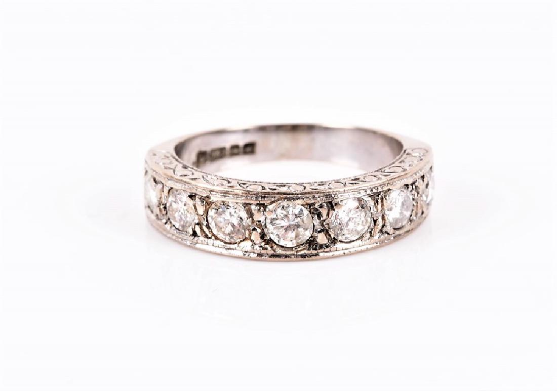 An 18 carat white gold diamond half eternity ring   (1 of 4)