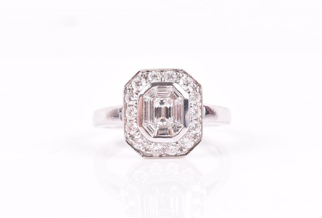 An 18ct white gold and diamond ring  calibre set with (1 of 3)