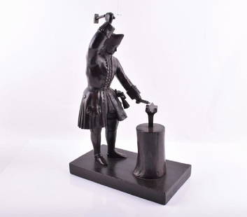 A turn of the century Russian bronze figure of a: A turn of the century Russian bronze figure of a blacksmith, purported to be Alexander the Great modelled with his arm raised stooped over a large anvil, 29 cm x 20 cm. Provenance: Iconastas Gallery,