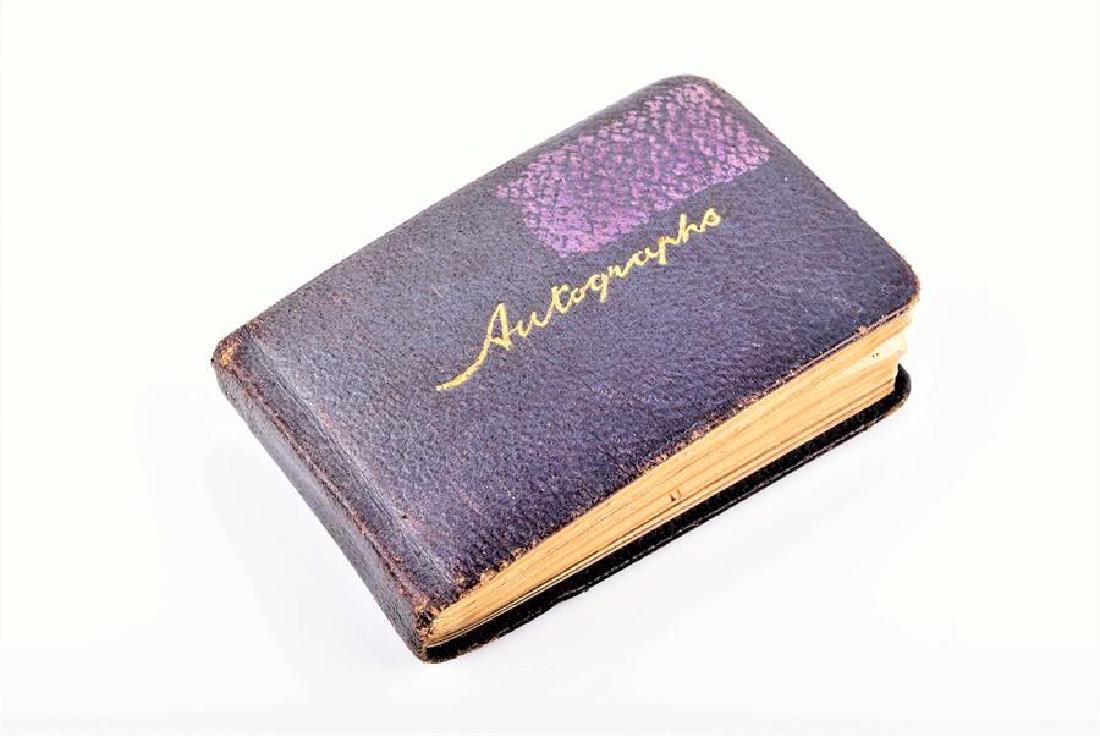 A early 20th century autograph book full of signatures: A early 20th century autograph book full of signatures by famous musicians and performers of the time predominantly acquired at the Leeds Town Hall in the 1930's, to include autographs by Richard Stra