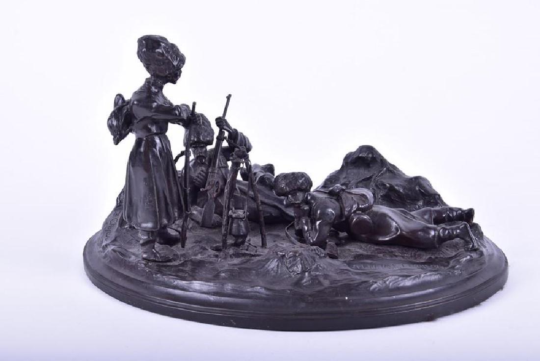 An early 20th century Russian patinated bronze group: An early 20th century Russian patinated bronze group after Vasilii Grachev (1831-1905) Russian, and Felix Chopin (1813-1892) French, modelled as a camping site with three Cossack soldiers, on a n