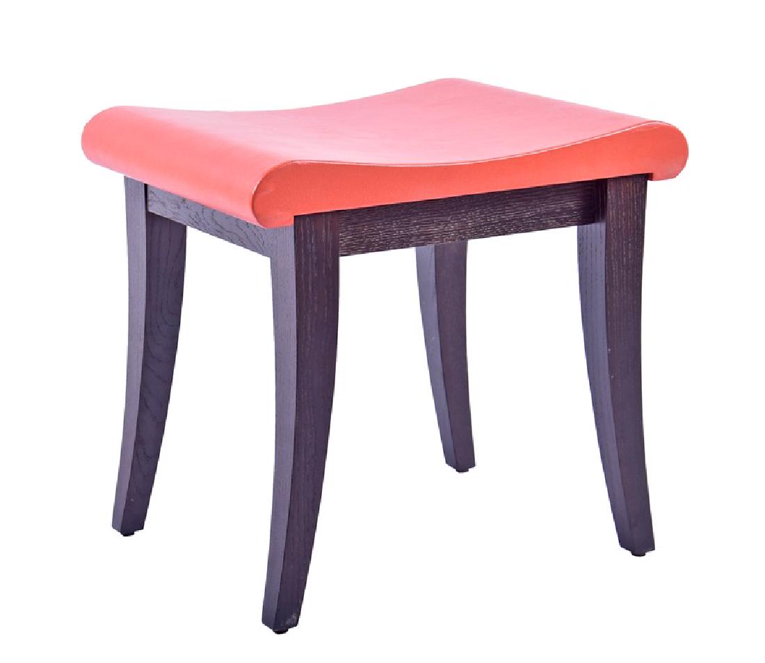 A Philippe Hurel dressing table stool made in: A Philippe Hurel dressing table stool made in solid hardwood with orange leather upholstery, the brass Hurel label to the interior base. (49 cm wide x 44 cm high)
