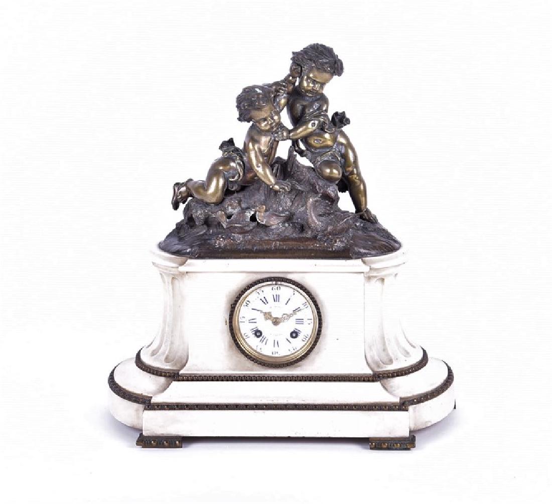 A French late 19th century patinated bronze and marble: A French late 19th century patinated bronze and marble clock of Classical theme modelled as two cherubs playing with ducks on a naturalistic base, the clock movement signed by 'Henry Marc, Paris' with
