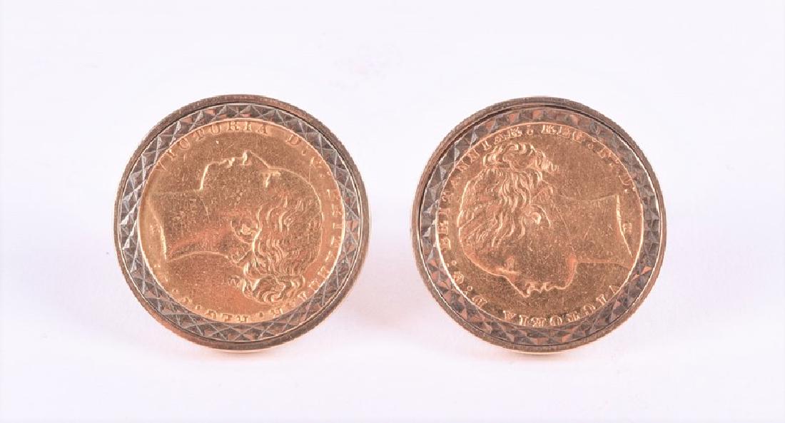 A pair of 9ct yellow gold and sovereign cufflinks set: A pair of 9ct yellow gold and sovereign cufflinks set with Victorian sovereigns, dated 1876.