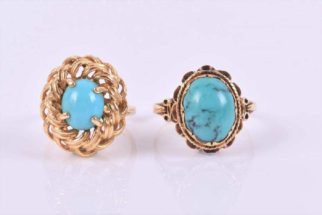 A turquoise ring the central oval turquoise within a: A turquoise ring the central oval turquoise within a stylised rope-twist border, in 18ct gold, size, H 1/2; and a turquoise ring, in 14ct gold, size N. (2)