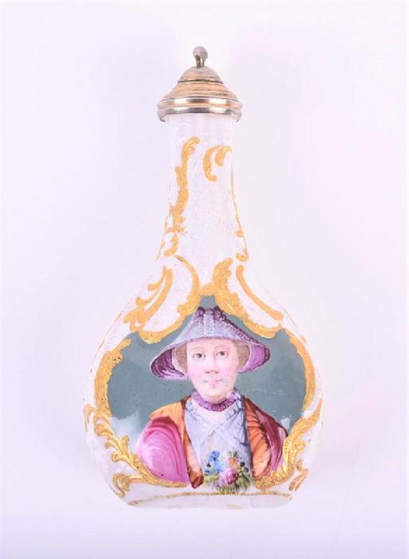 An 18th century Bilston flask-form enamel scent bottle: An 18th century Bilston flask-form enamel scent bottle circa 1760, bearing a hand-painted portrait of Lady Fenhoulet, the reverse with a floral spray, on an ivory ground with gilt finish and a later w