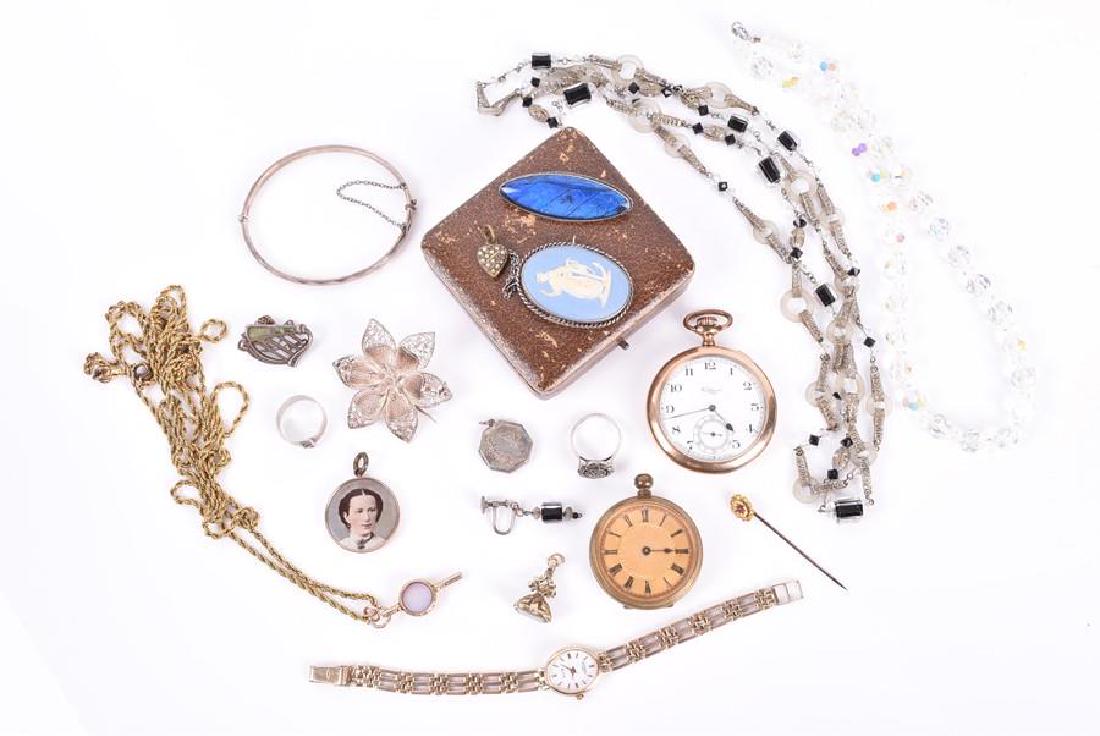 A miscellaneous collection of jewellery comprising: a: A miscellaneous collection of jewellery comprising: a chalcedony fob seal pendant; a gold-plated rope-twist muff chain, suspended with a watch key, inset with two hardstones; a Victorian portrait lock