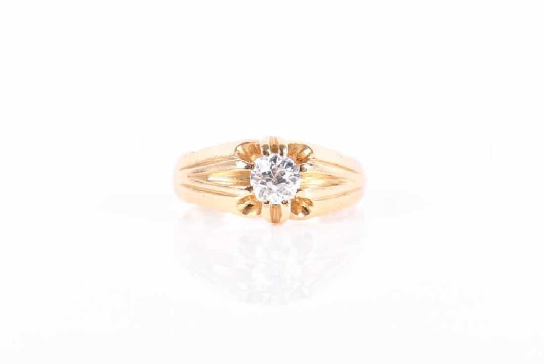 An 18ct yellow gold solitaire diamond ring set with an: An 18ct yellow gold solitaire diamond ring set with an old-cut diamond of approximately 0.40 carats, size O 1/2, 6 grams.