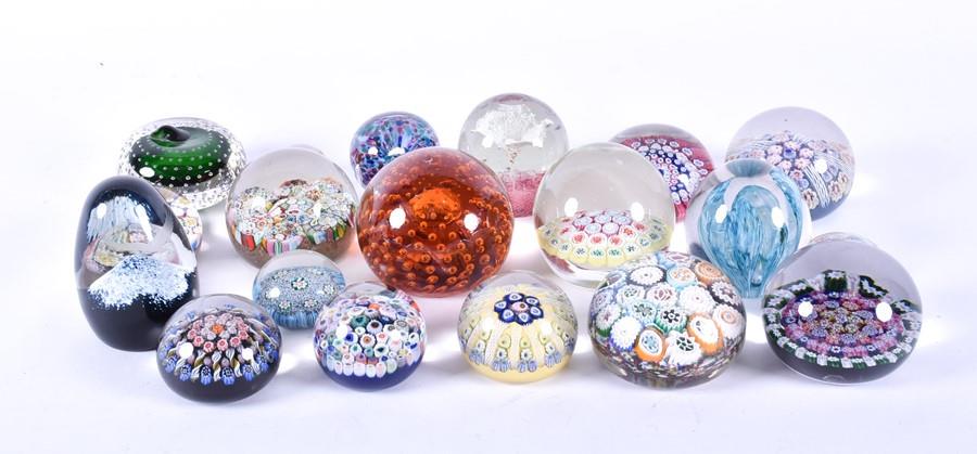 A collection of glass paperweights   to include various (1 of 10)