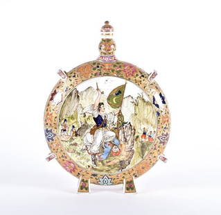 A large Hungarian enamelled earthenware moon flask : A large Hungarian enamelled earthenware moon flask by J. Fischer, Budapest, designed with a circular front victorious battle scene, with a gilt surround and stylised floral designs throughout, 39