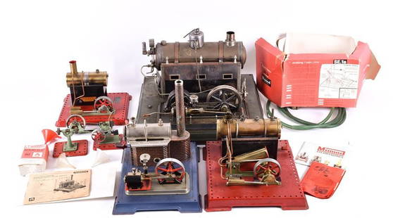 An early 20th century German Marklin No.4098/92/8: An early 20th century German Marklin No.4098/92/8 tinplate stationary steam engine with Marklin Germany label, instruction booklet, and alternator, together with a Mamod SE1a s stationary steam engine