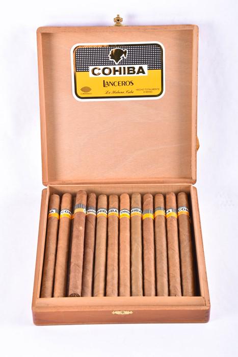 A box of 25 Cohiba Lanceros cigars (opened), from: A box of 25 Cohiba Lanceros cigars (opened), from Habanos, Cuba.