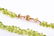 A faceted peridot bead necklace comprised of - 2