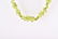 A faceted peridot bead necklace comprised of - 3