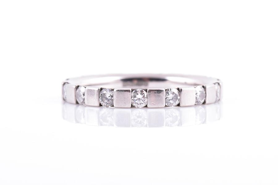 A platinum and diamond eternity ring by Christian Bauer (1 of 4)