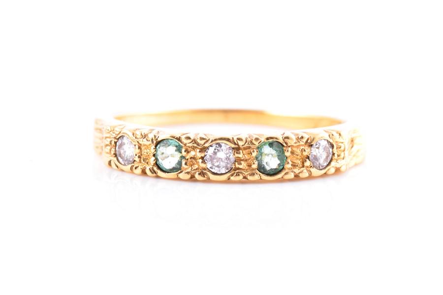 A yellow metal, diamond, and emerald ring  the band (1 of 3)