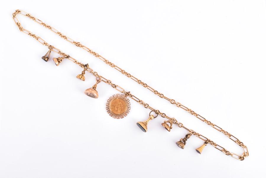 A yellow metal fancy-link necklace  suspended with (1 of 4)