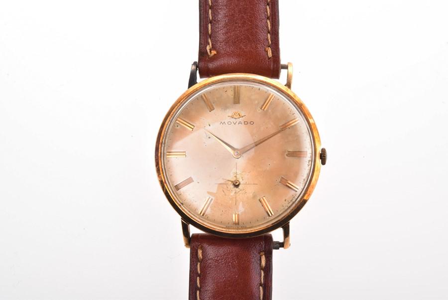 A Movado 14ct yellow gold mechanical wristwatch the: A Movado 14ct yellow gold mechanical wristwatch the silvered dial with baton indices and subsidiary seconds dial, in a 14ct gold case with repaired lugs, numbered B77846 42789. The Movado 15 jewel mov