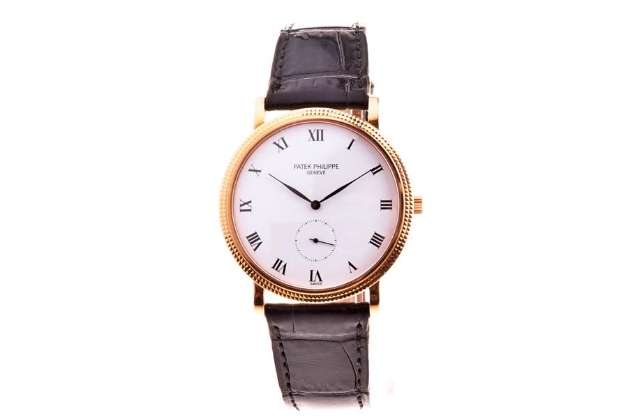 A fine Patek Philippe Calatrava ref. 3919R 18ct rose: A fine Patek Philippe Calatrava ref. 3919R 18ct rose gold wristwatch the white enamel dial signed Patek Philippe Geneve, with black Roman numerals, slim black polished hands and subsidiary seconds dia