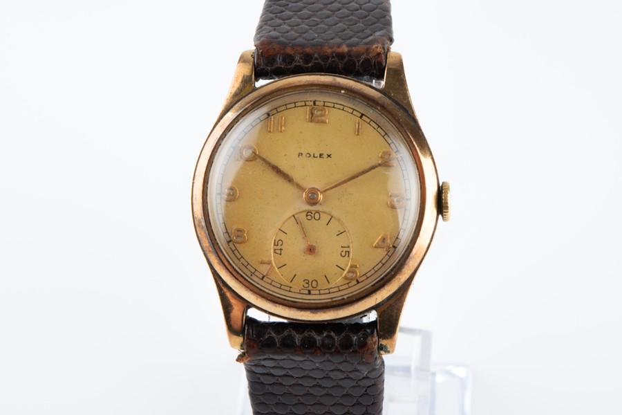 A 1950s Rolex 9ct yellow gold mechanical wristwatch (1 of 9)