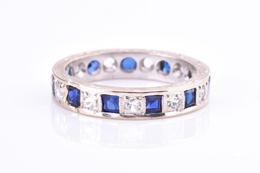 A blue and white stone eternity ring  set with cubic (1 of 6)
