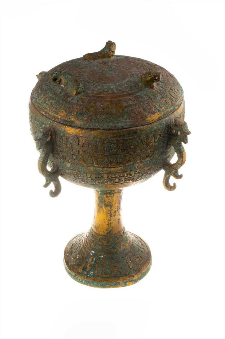 A Chinese archaic style Dou lidded vessel with carved (1 of 4)