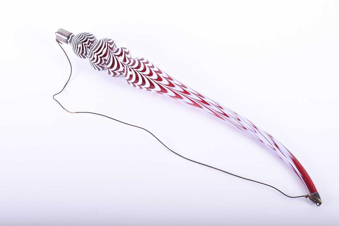 A large Nailsea glass scent phial, the cranberry (1 of 3)