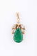 A yellow metal, diamond and emerald pendant, set with a