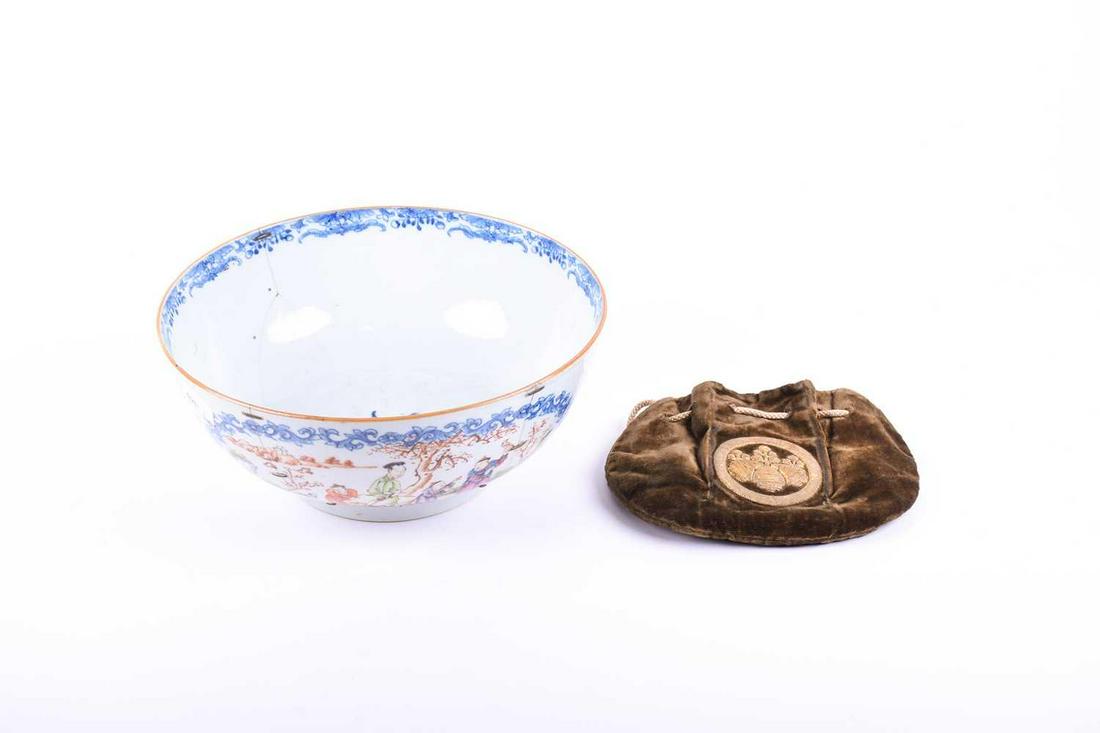 An 18th century Chinese mandarin palette bowl, the: An 18th century Chinese mandarin palette bowl, the exterior painted with figures within a garden setting, 23cm dia, together with a Japanese Edo period plush purse, embroidered with a paulownia mon, w