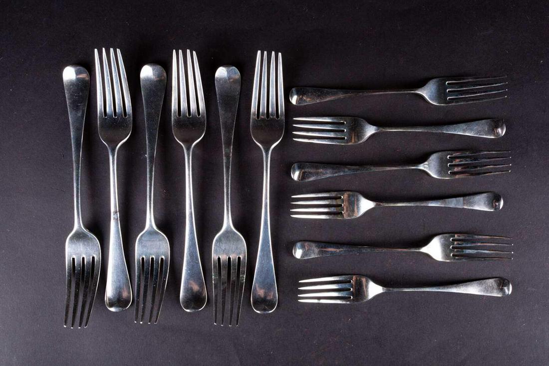 A set of six George III silver table forks, London 1801: A set of six George III silver table forks, London 1801 by Christopher & Thomas Wilkes Barker, together with six dessert forks, London 1808, by James Beebe, 17 ozt. combined weight.