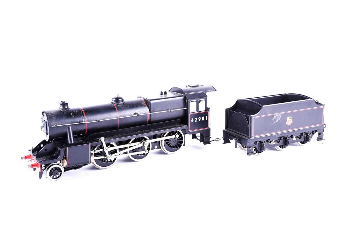 A spirit fired live steam Bassett-Lowke 0 Gauge model: A spirit fired live steam Bassett-Lowke 0 Gauge model of a British Railways Ex-LMS Stanier 2-6-0 Mogul tender locomotive, a 'Special Commemorative Release 2000'. Limited edition brass plaque fitted, n