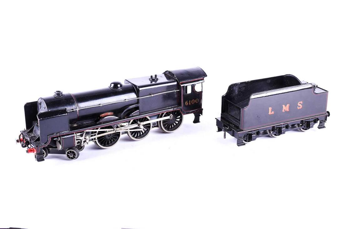 A Bassett-Lowke 0 Gauge 3-rail LMS 'Royal Scot': A Bassett-Lowke 0 Gauge 3-rail LMS 'Royal Scot' Locomotive and Tender, ref 5611/0, in LMS black as no 6100, post war model with probable later parts in a reproduction box with label. Being sold in aid