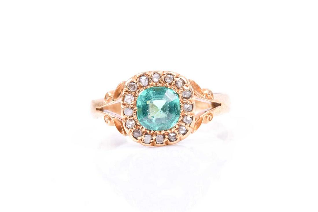 An 18ct yellow gold, diamond, and emerald paste ring,: An 18ct yellow gold, diamond, and emerald paste ring, set with a mixed square-cut emerald within a border of old-cut diamonds, split detail to shoulders, size N 1/2, 3.2 grams.